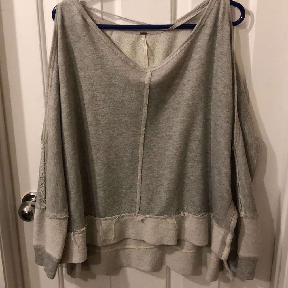 Free people distressed cut out shoulder sweater.